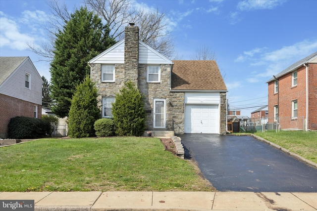 510 W S Ave, Glenolden, PA 19036 - view of front of property featuring a front yard, stone siding, a garage, a chimney, and aphalt driveway