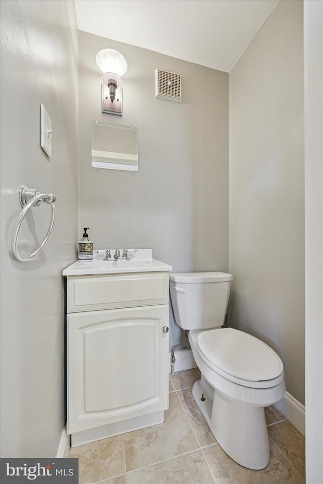 510 W S Ave, Glenolden, PA 19036 - half bath featuring vanity, baseboards, tile patterned floors, toilet, and visible vents