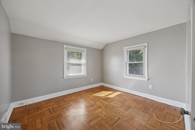 510 W S Ave, Glenolden, PA 19036 - empty room with baseboards, lofted ceiling, and plenty of natural light