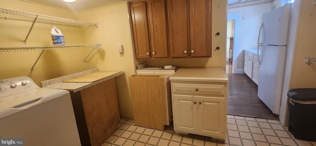 209 N Pine St, Seaford, DE 19973 - laundry room featuring washer / clothes dryer and cabinet space