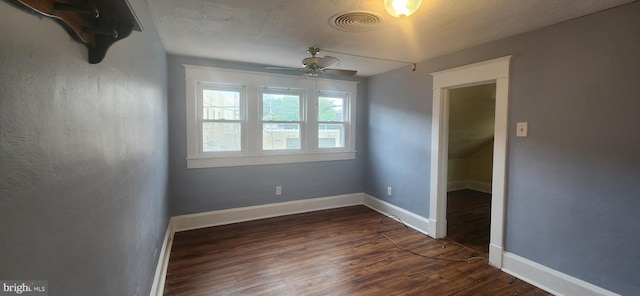 209 N Pine St, Seaford, DE 19973 - spare room with dark wood-style floors, ceiling fan, and baseboards