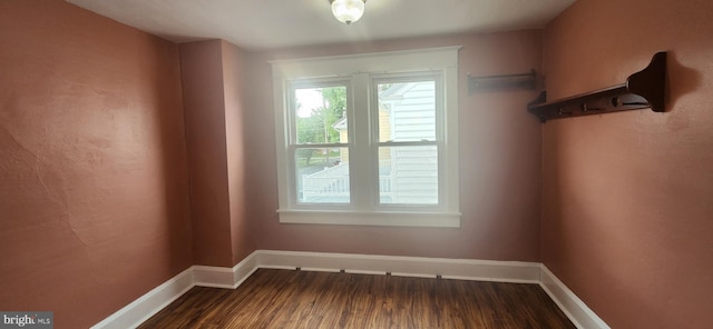 209 N Pine St, Seaford, DE 19973 - unfurnished room featuring dark wood-type flooring and baseboards