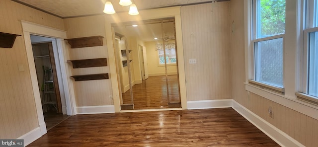 209 N Pine St, Seaford, DE 19973 - unfurnished dining area with wood finished floors and baseboards
