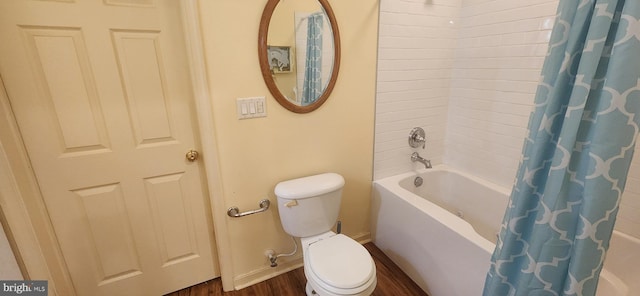 209 N Pine St, Seaford, DE 19973 - full bath featuring toilet, shower / tub combo with curtain, wood finished floors, and baseboards
