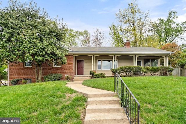 single story home featuring a front lawn, a chimney, brick siding, and cooling unit