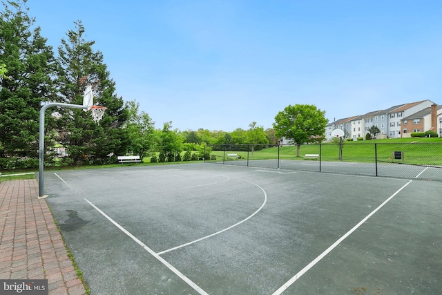 view of sport court with fence and community basketball court