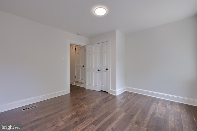 311 E Frederick St, Lancaster, PA 17602 - unfurnished bedroom featuring dark wood-type flooring and a closet
