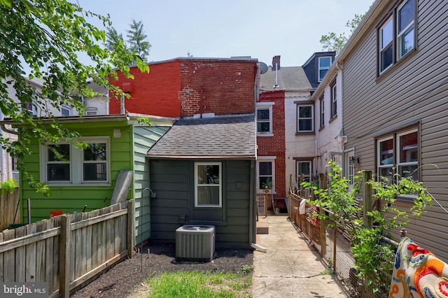 311 E Frederick St, Lancaster, PA 17602 - rear view of property with roof with shingles and a patio area