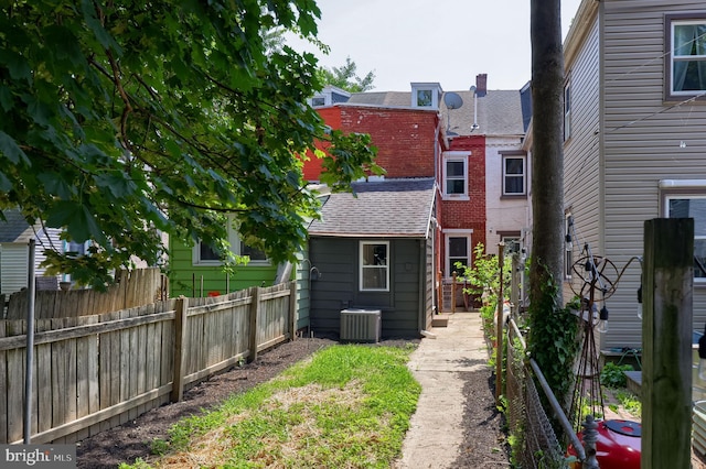 311 E Frederick St, Lancaster, PA 17602 - back of property with a shingled roof and a fenced backyard