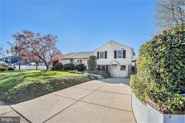 3839 Chalfont Dr, Philadelphia, PA 19154 - view of front of property with a front lawn, fence, and driveway