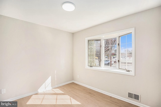 3839 Chalfont Dr, Philadelphia, PA 19154 - empty room with baseboards, wood finished floors, and visible vents