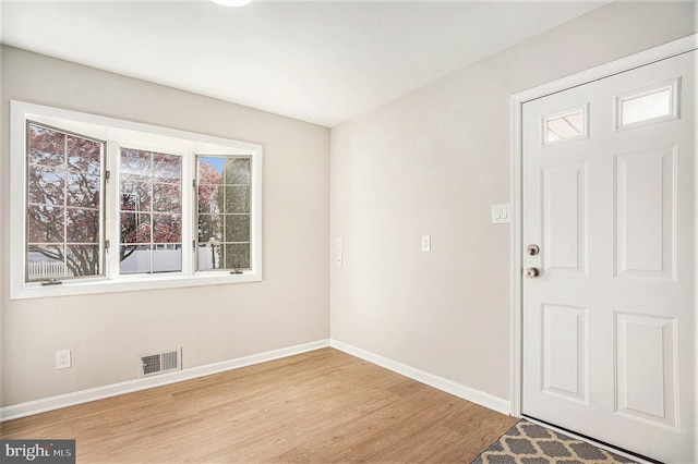 3839 Chalfont Dr, Philadelphia, PA 19154 - foyer with baseboards, light wood finished floors, and visible vents
