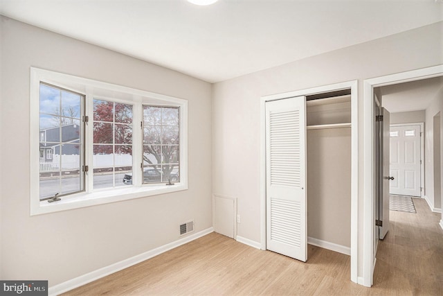 3839 Chalfont Dr, Philadelphia, PA 19154 - unfurnished bedroom with light wood-style flooring, a closet, baseboards, and visible vents