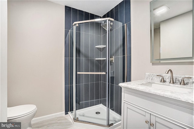 3839 Chalfont Dr, Philadelphia, PA 19154 - bathroom featuring baseboards, toilet, vanity, and a stall shower