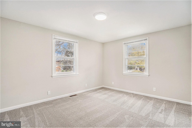 3839 Chalfont Dr, Philadelphia, PA 19154 - carpeted empty room with baseboards, visible vents, and plenty of natural light