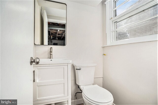 3839 Chalfont Dr, Philadelphia, PA 19154 - half bath with baseboards, toilet, and vanity