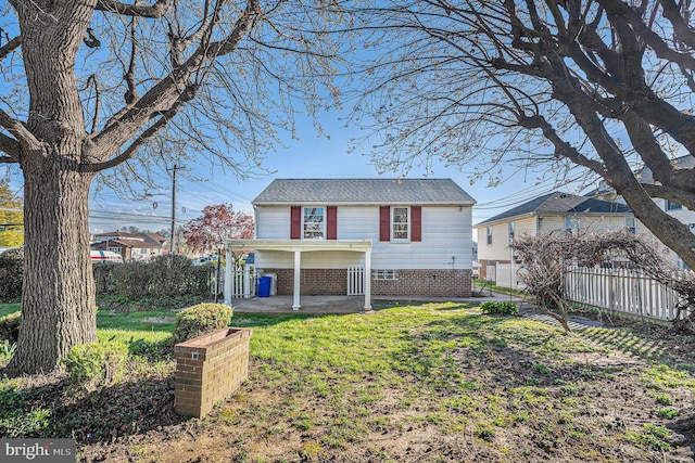 3839 Chalfont Dr, Philadelphia, PA 19154 - view of front of property featuring fence, a shingled roof, and a front lawn