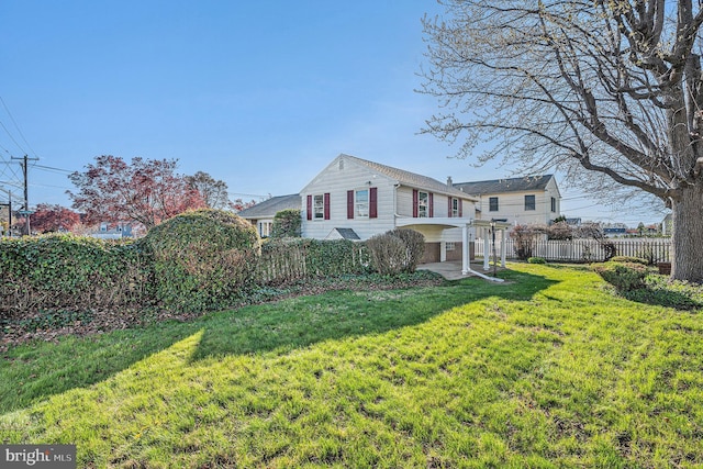 3839 Chalfont Dr, Philadelphia, PA 19154 - view of side of property featuring a yard, a patio area, and fence