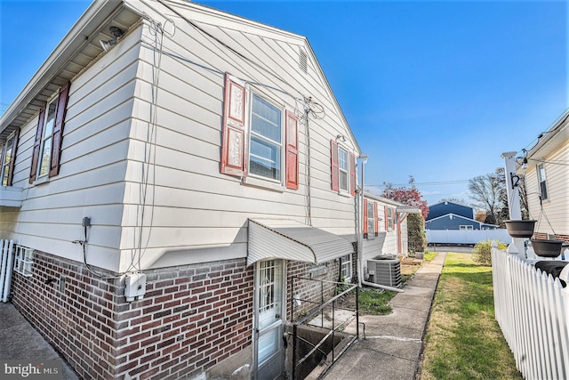 3839 Chalfont Dr, Philadelphia, PA 19154 - view of side of property with fence and central air condition unit