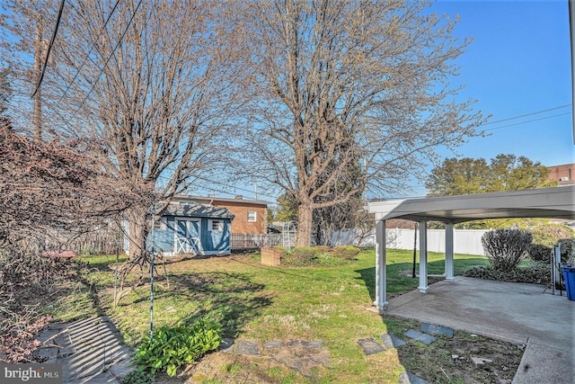 3839 Chalfont Dr, Philadelphia, PA 19154 - view of yard featuring a patio area, a fenced backyard, an outbuilding, and a shed