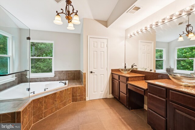 5856 Kittewan Ct, Manassas, VA 20112 - bathroom with a chandelier, tile patterned flooring, a garden tub, and double vanity