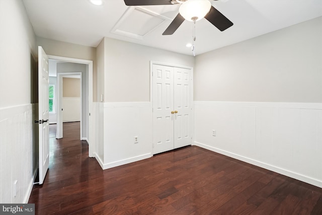 5856 Kittewan Ct, Manassas, VA 20112 - unfurnished bedroom featuring a wainscoted wall, dark wood-type flooring, a ceiling fan, a closet, and recessed lighting