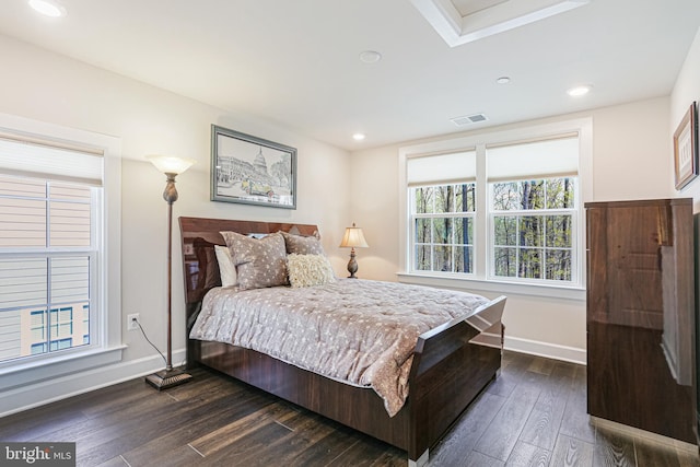 bedroom with recessed lighting, baseboards, visible vents, and dark wood-style floors