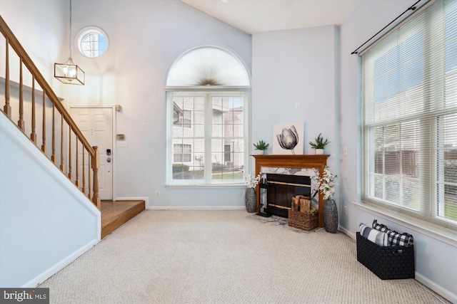 3913 Ettrick Ct Unit 10-38, Bowie, MD 20716 - living area with carpet flooring, baseboards, stairway, and a high end fireplace