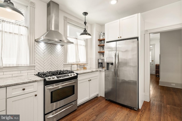 4916 40th Pl, Hyattsville, MD 20781 - kitchen featuring appliances with stainless steel finishes, wall chimney exhaust hood, white cabinets, dark wood-style flooring, and recessed lighting