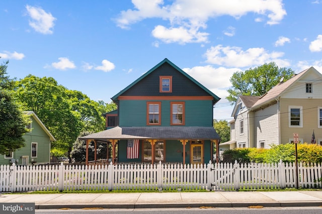 4916 40th Pl, Hyattsville, MD 20781 - victorian-style house with covered porch and a fenced front yard