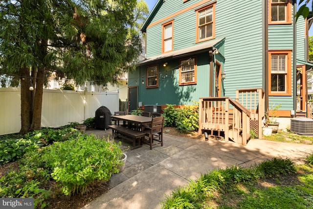 4916 40th Pl, Hyattsville, MD 20781 - view of patio with cooling unit and outdoor dining space