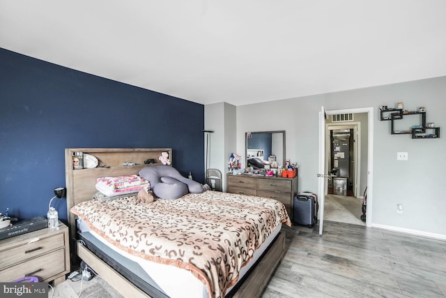 11326 Appledowre Way Unit 154, Germantown, MD 20876 - bedroom with wood finished floors and baseboards