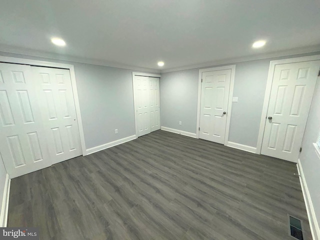 18 Grayson Cir, Willingboro, NJ 08046 - unfurnished bedroom with visible vents, baseboards, recessed lighting, dark wood-type flooring, and multiple closets