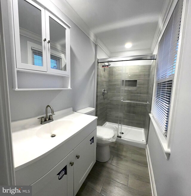 18 Grayson Cir, Willingboro, NJ 08046 - full bath with a stall shower, baseboards, toilet, ornamental molding, and vanity