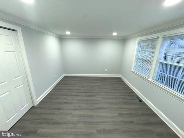 18 Grayson Cir, Willingboro, NJ 08046 - empty room featuring dark wood-style flooring, visible vents, ornamental molding, and baseboards