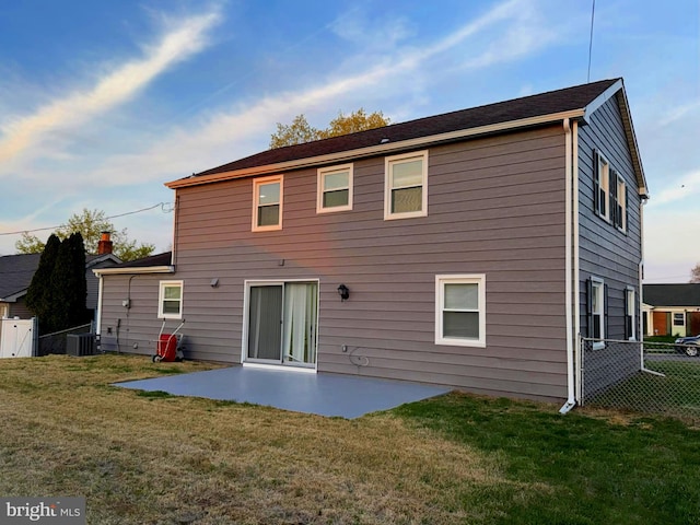 18 Grayson Cir, Willingboro, NJ 08046 - back of property featuring a patio, fence, a lawn, and central AC unit