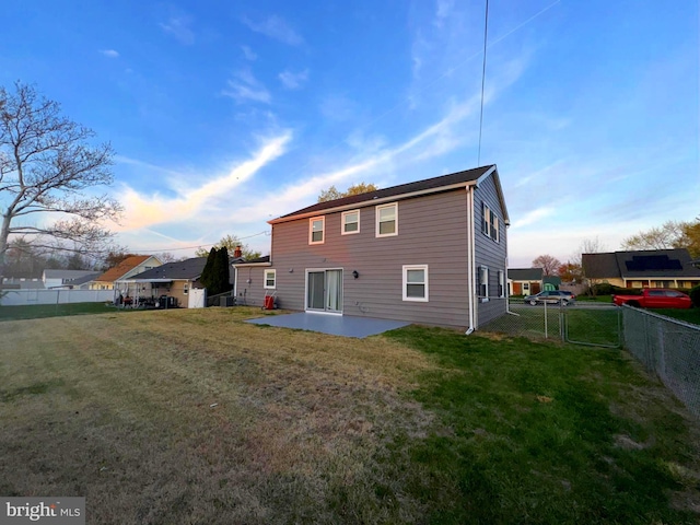 18 Grayson Cir, Willingboro, NJ 08046 - rear view of property featuring a gate, a patio area, a yard, and a fenced backyard