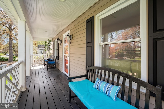 wooden deck with a porch