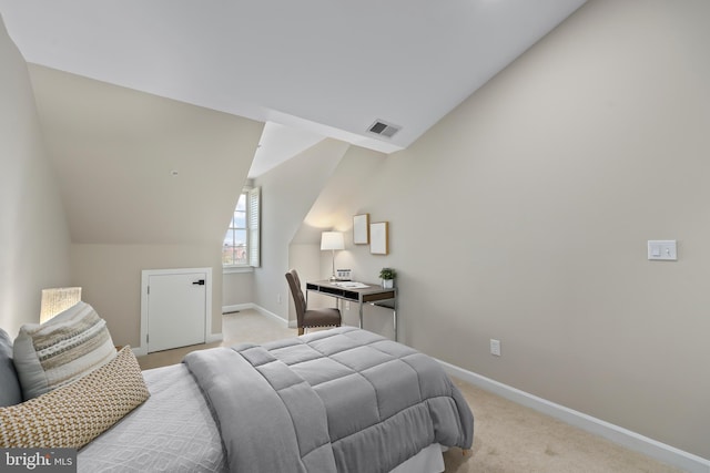 bedroom featuring light colored carpet, lofted ceiling, visible vents, and baseboards