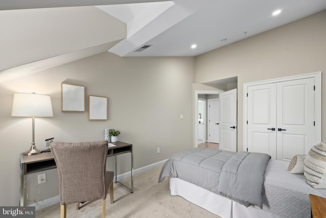 bedroom featuring vaulted ceiling, visible vents, carpet flooring, and baseboards