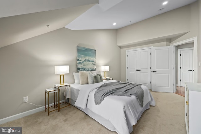 bedroom featuring light carpet, vaulted ceiling, baseboards, and recessed lighting
