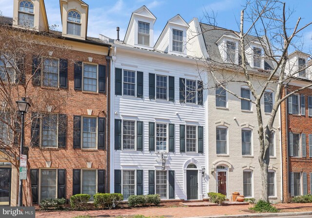 view of front of home with brick siding
