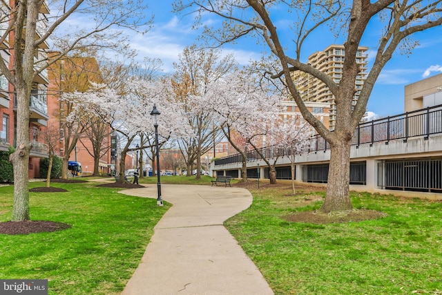 surrounding community featuring a lawn