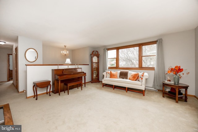 living area featuring baseboards, carpet flooring, and a chandelier