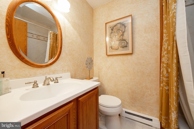 bathroom featuring a baseboard radiator, toilet, and vanity