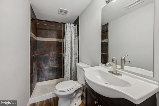 6 Walnut Dr, Burlington, NJ 08016 - bathroom with toilet, visible vents, vanity, and tiled shower