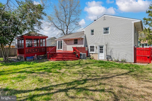 6 Walnut Dr, Burlington, NJ 08016 - back of property with central AC, a gazebo, a lawn, fence, and a wooden deck