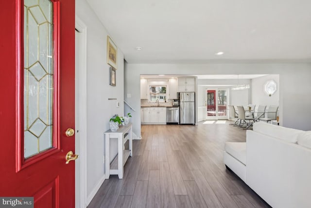 6 Walnut Dr, Burlington, NJ 08016 - living area with baseboards, wood finished floors, and recessed lighting