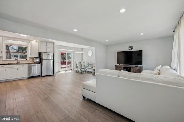 6 Walnut Dr, Burlington, NJ 08016 - living room with a wealth of natural light, light wood finished floors, and recessed lighting