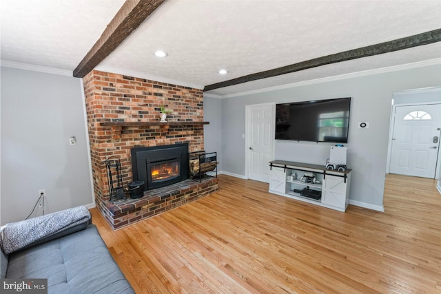 unfurnished living room with baseboards, beamed ceiling, recessed lighting, and wood finished floors